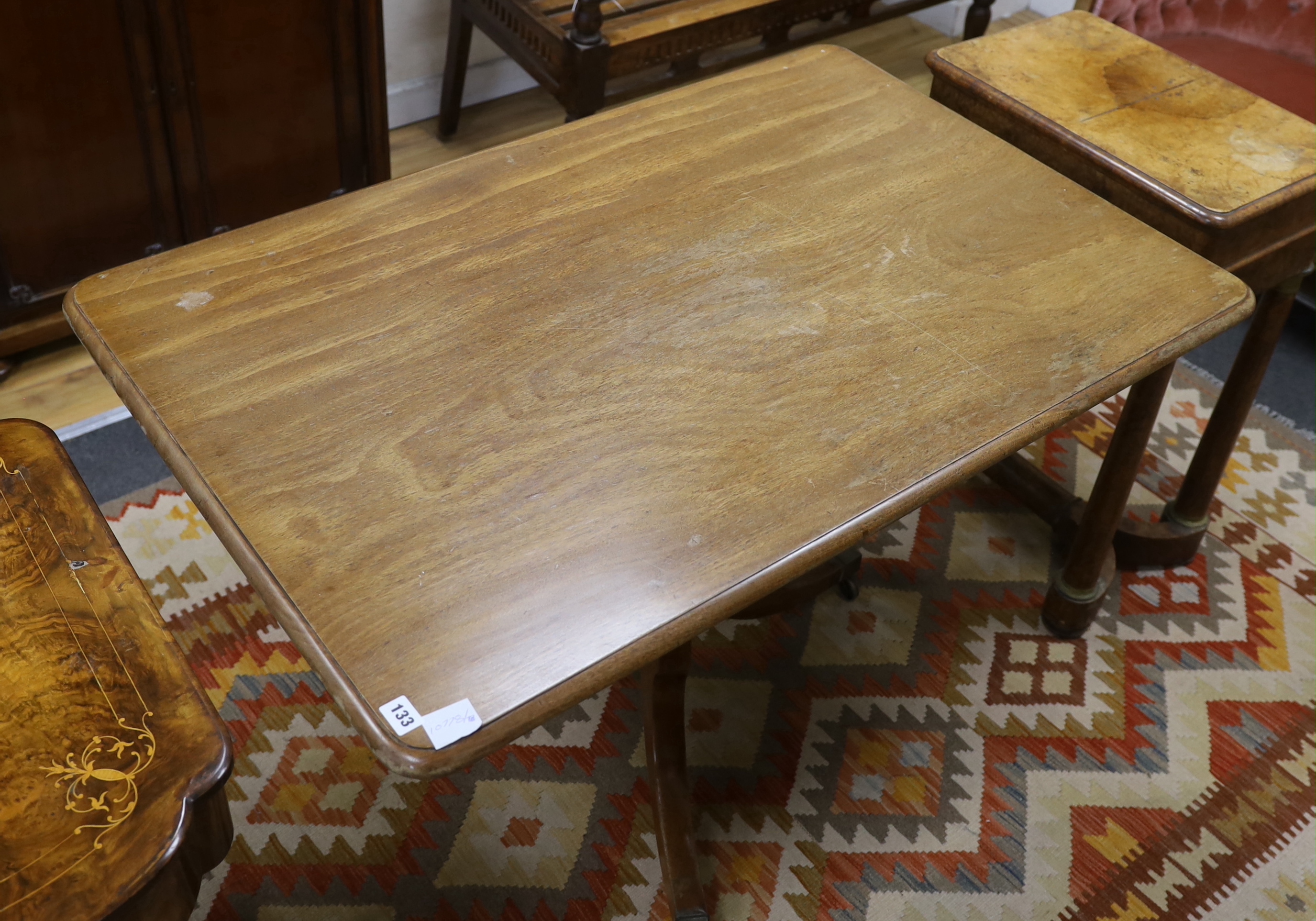 A Regency rectangular mahogany tilt top breakfast table, width 112cm, depth 73cm, height 74cm